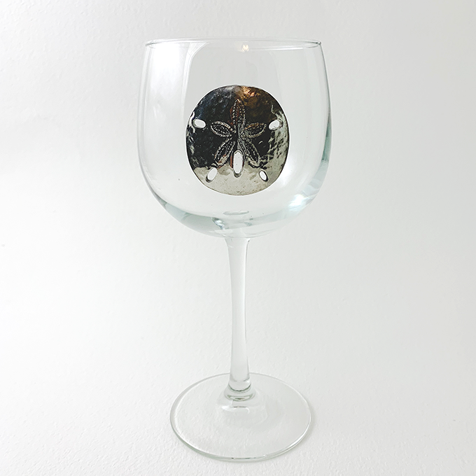 red wine glass sand dollar
